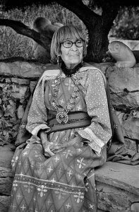 A Black and white portrait of Maria Martinez. Native pueblo potter. Traditional clothing