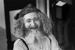 Black and white portrait of artist Tommy Macaione in Santa Fe, New Mexico.