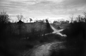Crossroads with a car in Indiana at dusk., Everything Else,
