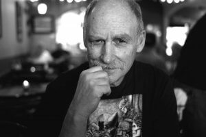 Black and white portrait of Artist Dennis Larkins