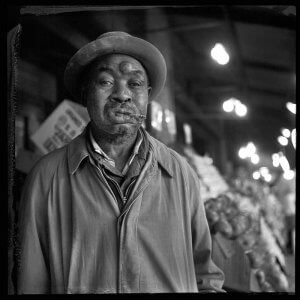 Black and white portrait of an African American man. Saint Louis Greyhound Bus station. 1964