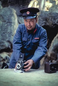 Man with camera. China 1984.