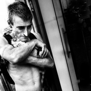Man and his cat. Porto, Portugal