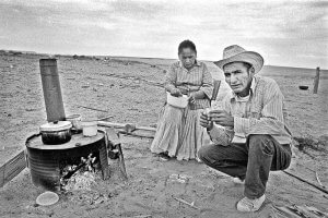 Navajo couple in their outdoor camp. Hopi-Navajo joint use land. Arizona.