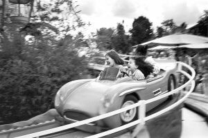 Girls on amusement ride. Tuileries Garden, Paris, France