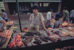Outdoor meat market. China 1984.