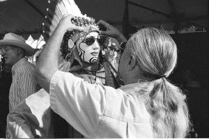 New Mexico Native dresses a mannequin Santa Fe Indian Market.