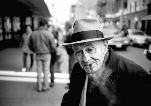 Black and white portrait of a man. New York City street.