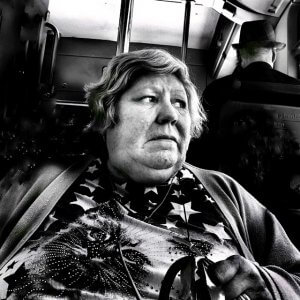 Black and white portrait of a Woman on bus. Porto, Portugal.